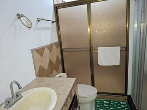 Shower, hair dryer, towels, soap