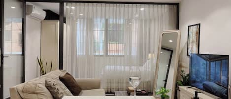 Luxury Apartment, 1 Bedroom, Balcony, Garden Area | Desk, free WiFi, bed sheets