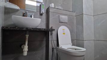 2 BHK Areca | Bathroom | Shower, rainfall showerhead, bidet, towels