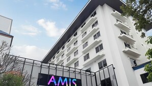 A multi-story building with a prominent 'AMIS' sign on the facade. - AMIS By Sima Thani (Nakhon Ratchasima)