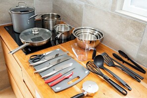 Fridge, microwave, stovetop, cookware/dishes/utensils