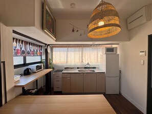 Fridge, microwave, cookware/dishes/utensils