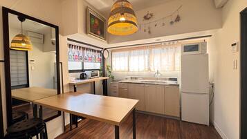 Fridge, microwave, cookware/dishes/utensils