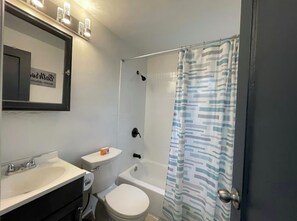 Hair dryer, towels, soap, toilet paper