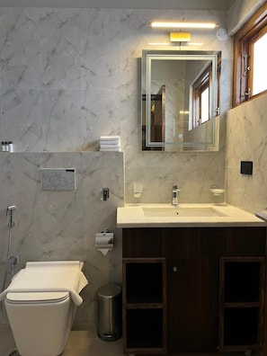 Shower, towels, soap, shampoo