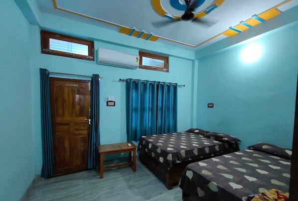 Family Room, Non Smoking, City View | Rollaway beds, free WiFi, bed sheets
