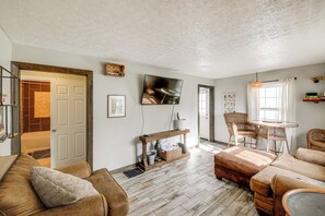TV, fireplace, books - 2 Blocks to Main St: Walkable Beech Grove Home! (Beech Grove)