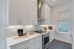 Full-sized fridge, microwave, oven, dishwasher