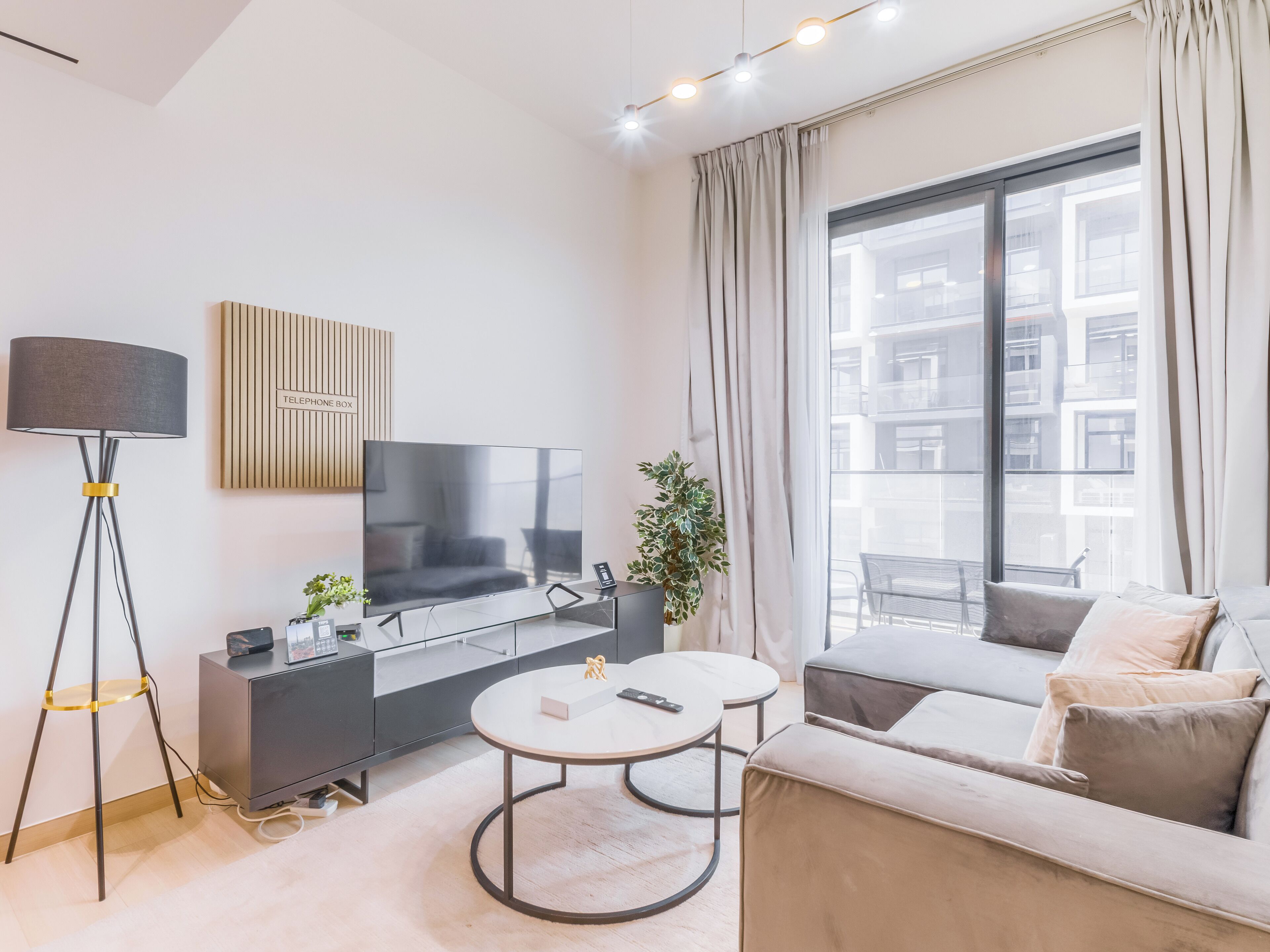 Apartment, Balcony, City View | Living area | 55-inch Smart TV with digital channels