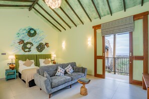 Superior Sea View Villa with Pool | Living area | 42-inch LED TV with cable channels