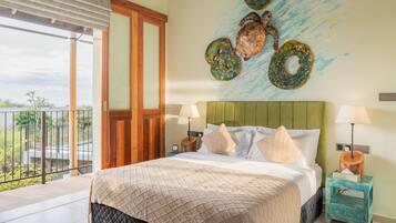 A bedroom with a bed, pillows, a nightstand, a lamp, a wall art piece, and a balcony with a view.