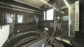 Villa, 3 Bedrooms, Garden View | Bathroom | Combined shower/tub, free toiletries, hair dryer, slippers
