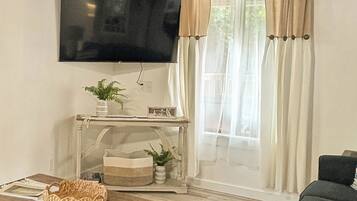 Family House | Living area | 20-inch Smart TV with digital channels