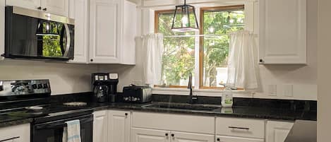 Family House | Private kitchen | Full-sized fridge, microwave, oven, stovetop