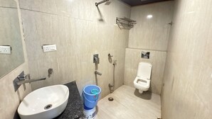 Deluxe Double Room | Bathroom | Shower, rainfall showerhead, towels, soap - Hotel Sacheti Yatri Niwas Ajmer  (Ajmer)