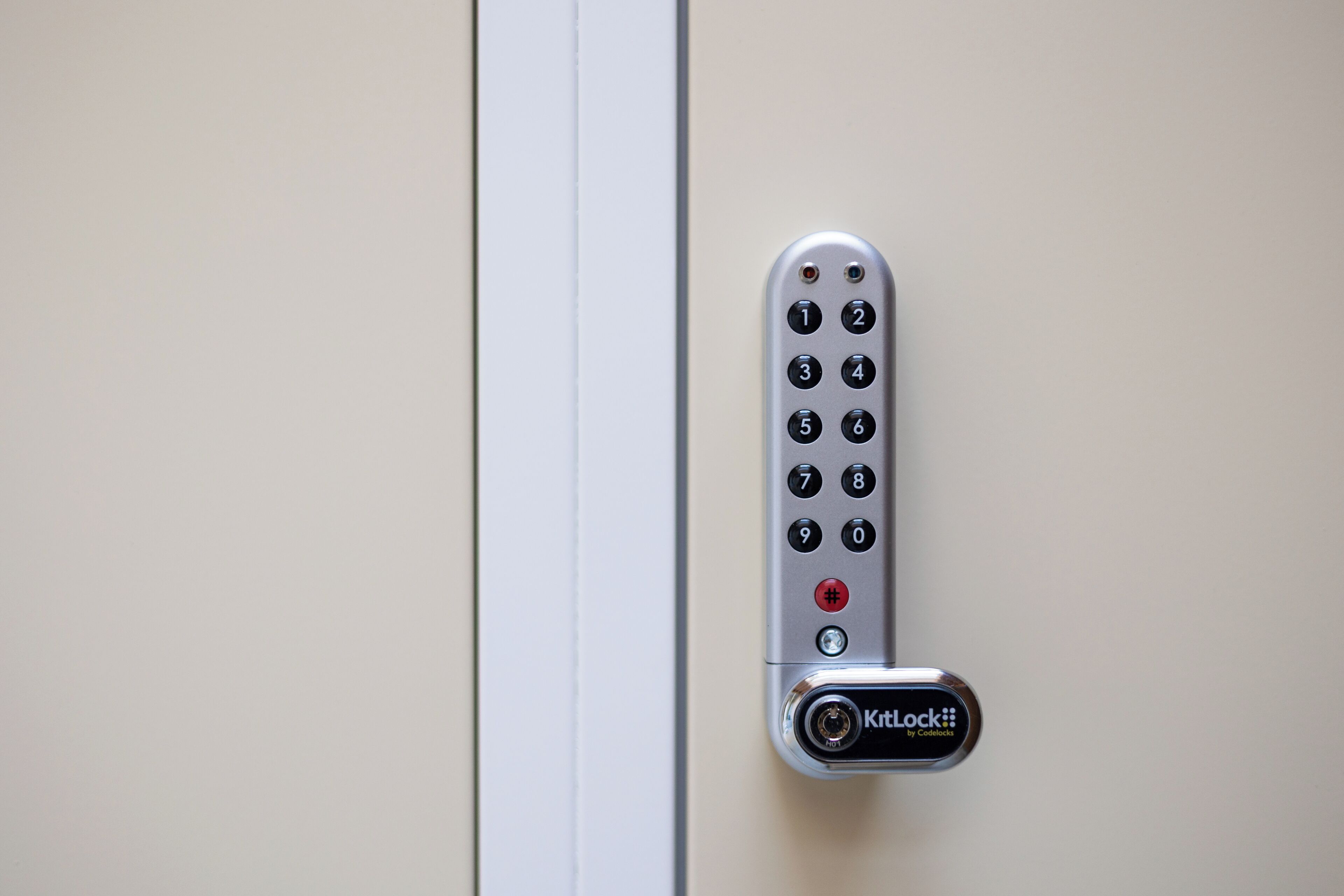 A keycard lock on a door.