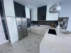 Fridge, microwave, coffee/tea maker, high chair