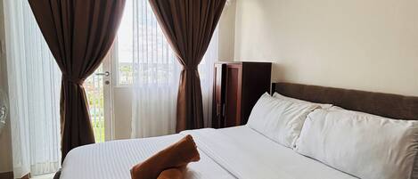 1 habitación, tabla de planchar con plancha, internet y ropa de cama