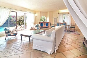 TV, fireplace, books