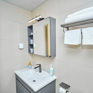 Hair dryer, towels, soap, toilet paper