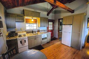 Fridge, microwave, stovetop, coffee/tea maker - Romantic Cabin Retreat with a Private Hot Tub and Pool in Wimberley, Texas (Wimberley)