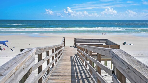 A wooden boardwalk leading to a beach with a clear view of the ocean. - Oceanfront, Pool, Tennis, BBQ, Patio, Free Parking (St. Augustine)