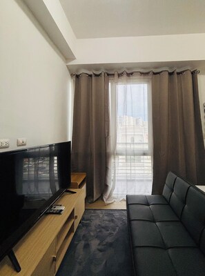 Chambre, 1 chambre, balcon, vue ville | Salle de séjour