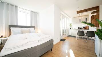 1 slaapkamer, een strijkplank/strijkijzer, reisbedje, gratis wifi