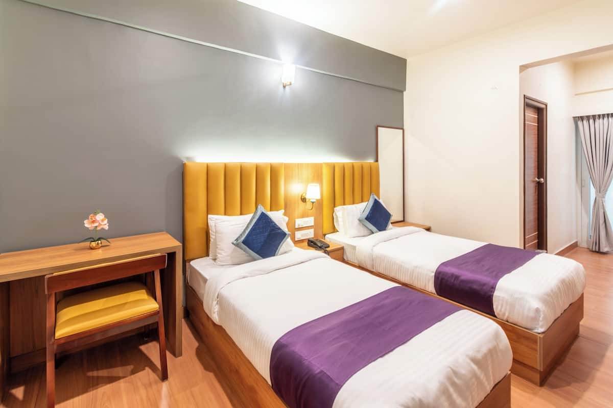 Premium Twin Room, Balcony, City View | Desk, laptop workspace, blackout drapes, soundproofing