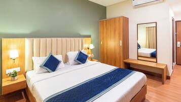 Desk, laptop workspace, blackout drapes, soundproofing