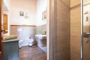 Villa, Patio, Garden View | Bathroom | Shower, hair dryer, bidet, towels