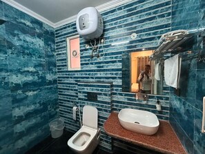 Superior Double Room, City View | Bathroom | Shower, slippers, towels, soap