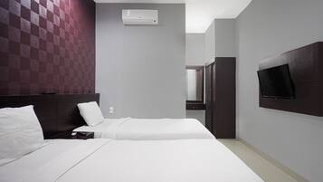 Habitación Deluxe con 2 camas individuales | Wifi gratis y ropa de cama