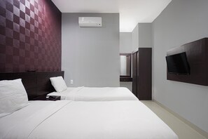 Habitación Deluxe con 2 camas individuales | Wifi gratis y ropa de cama