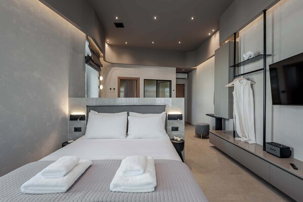 خزنة داخل الغرفة ومكواة/لوح كي وواي فاي مجانًا وملاءات أسرّة