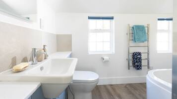 Shower, eco-friendly toiletries, hair dryer, towels