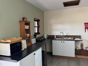 Apartamento, vistas al jardín | Cocina privada