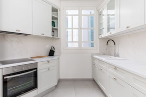 Apartment, 2 Bedrooms, Balcony | Private kitchen | Coffee/tea maker, electric kettle