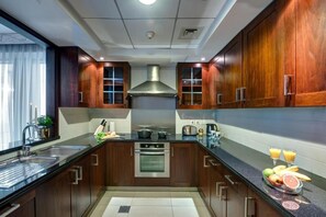 Apartamento, sacada | Cozinha privada
