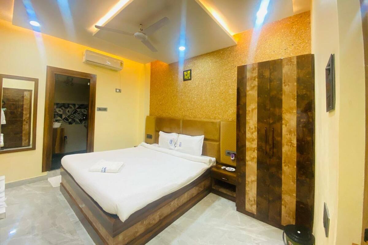 Quarto casal luxo, vista para a cidade | Wi-Fi de cortesia, roupa de cama