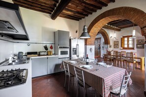 Villa, Patio, Garden View | Private kitchen | Fridge, stovetop, espresso maker, highchair