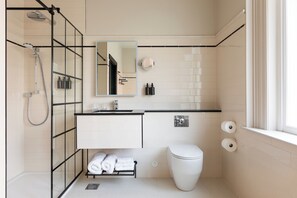 Hair dryer, slippers, towels, soap