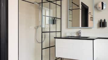 Designer toiletries, hair dryer, bathrobes, slippers