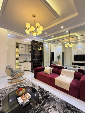 Deluxe appartement, balkon, uitzicht op de stad | Woonruimte