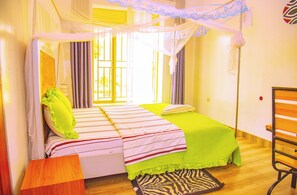 Double Room, Courtyard View | Iron/ironing board, free WiFi