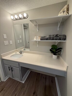 Dutxa, assecador de cabells i tovalloles 