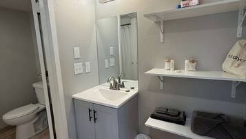 Shower, hair dryer, shampoo
