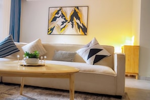 Deluxe Apartment, 2 Bedrooms, Balcony, City View | Living area