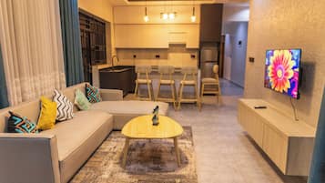 Deluxe Apartment, 2 Bedrooms, Balcony, City View | Living area