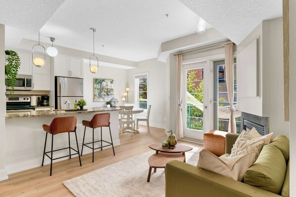 TV, fireplace - 13th Ave • DT Calgary • 2BD 2BA • Sleeps 5 (Calgary)